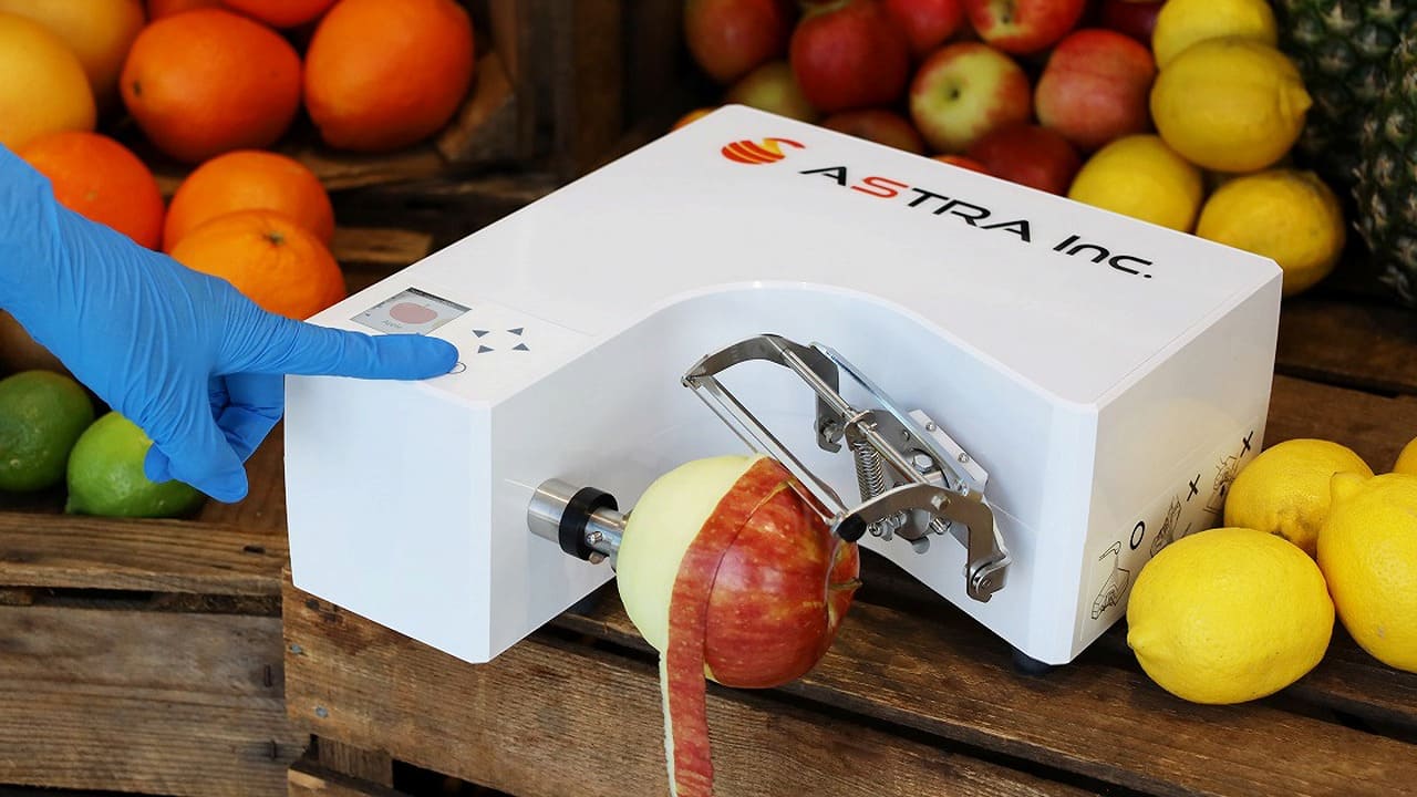 Peeling an apple with ASTRA's automated peeling machine KA-700H Shunsuke